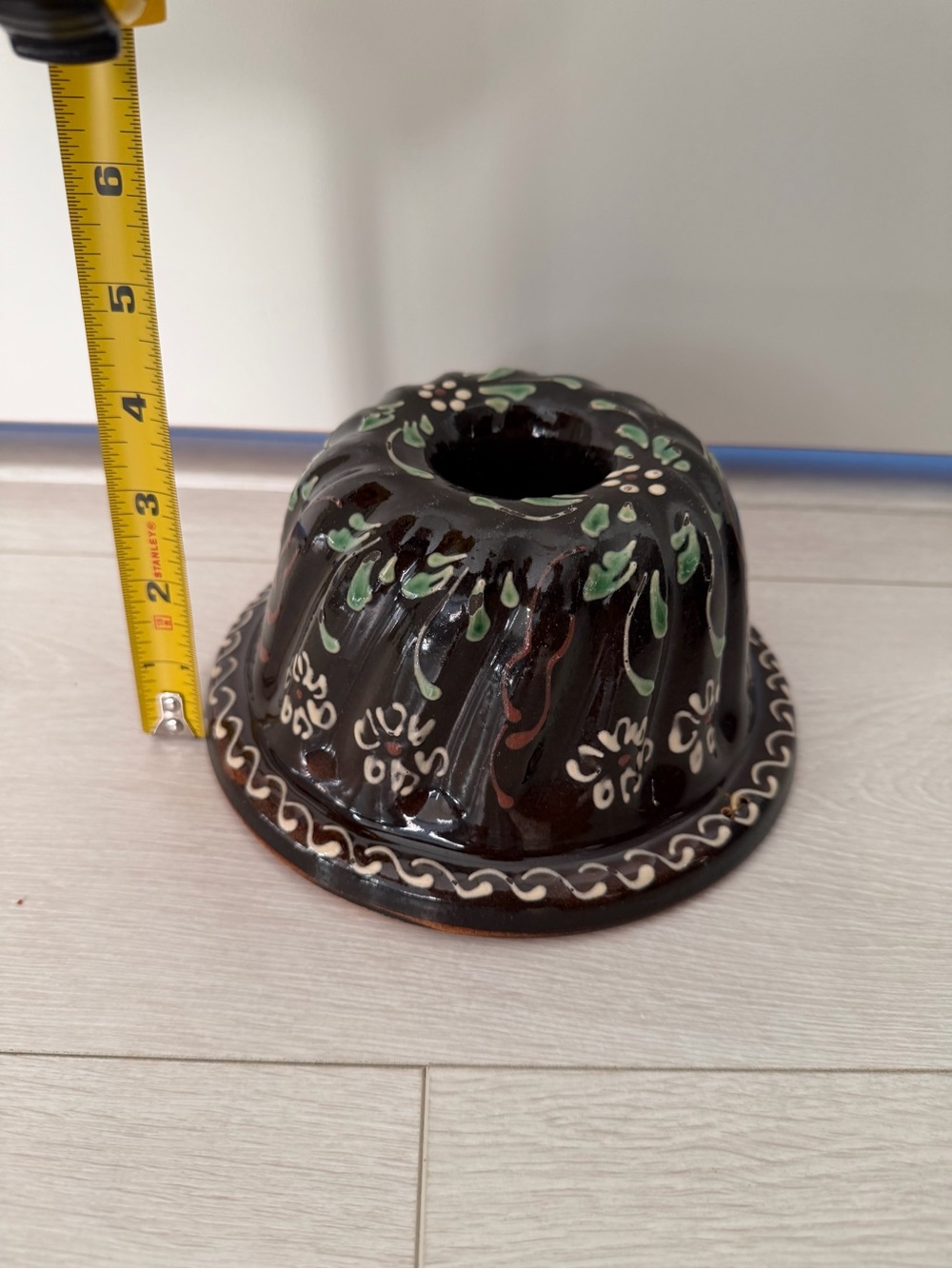 French Handpainted Ceramic Bundt Pan - Brown with Green & White Floral Design.